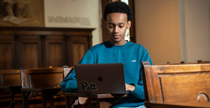 Student working on a laptop